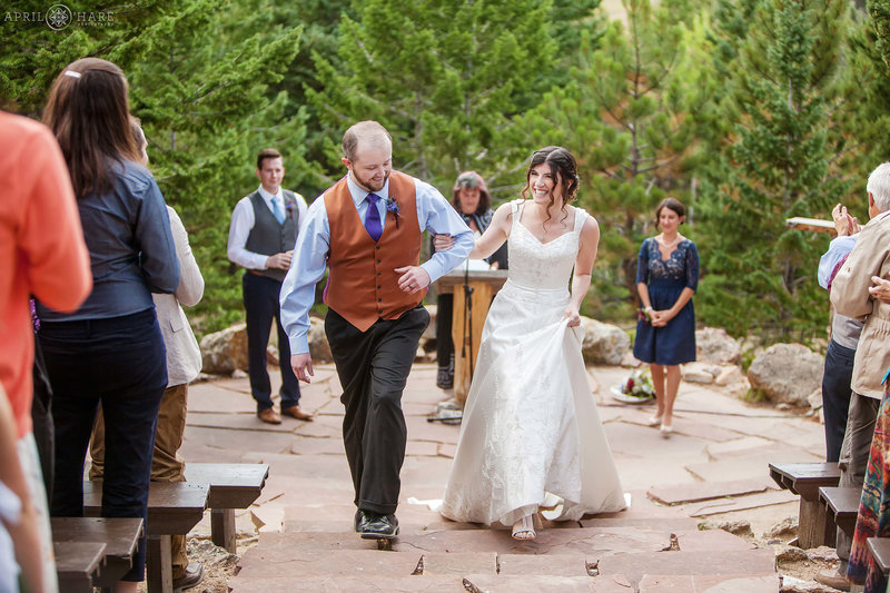 Summer Camp wedding ceremony at the Amphitheater at Colorado Mountain Ranch in Boulder