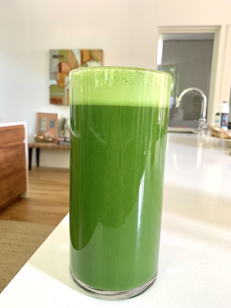 Large glass of fresh organic green juice