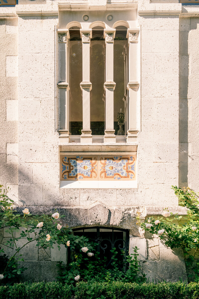A limestone architectural highlight on the facade of Chateau Charente, showcasing the 18th-century craftsmanship that embodies the timeless elegance and rich history of this restored gem, blending heritage with modern luxury.