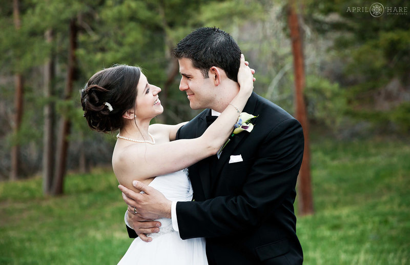 Romantic wedding picture in the woods at The Pines at Genesee Wedding Venue