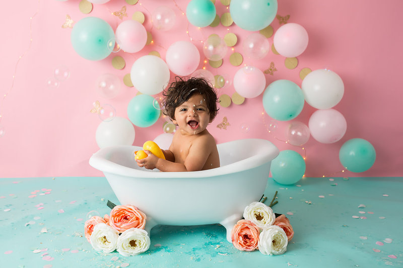 Baby splashing in tub