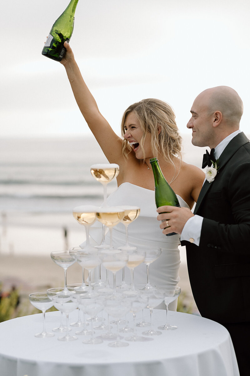 couple smiling with champagne