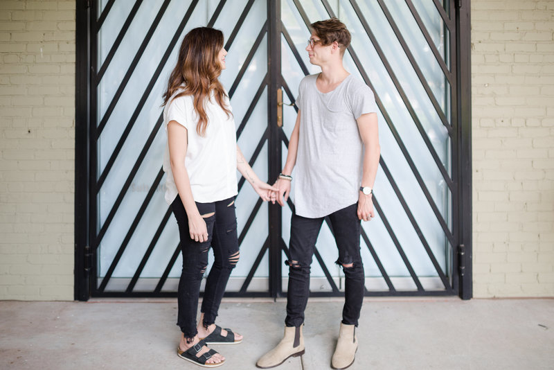 Beacon church atlanta pastors hold hands in front of geometric wall