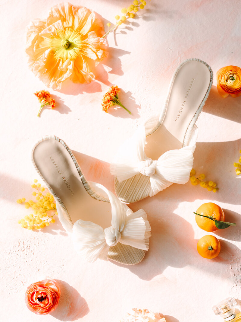stylized image of wedding shoes with flowers