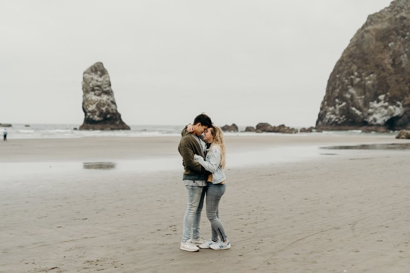 couple standing on beach