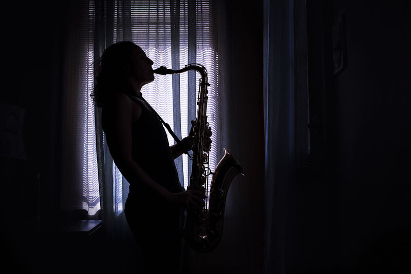 Tammy Karin playing tenor sax in 2020.