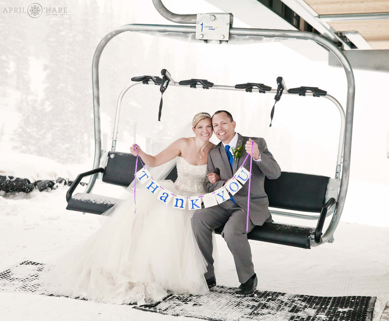 Cute chjairlift wedding photo on the Black Mountain Express at ABasin