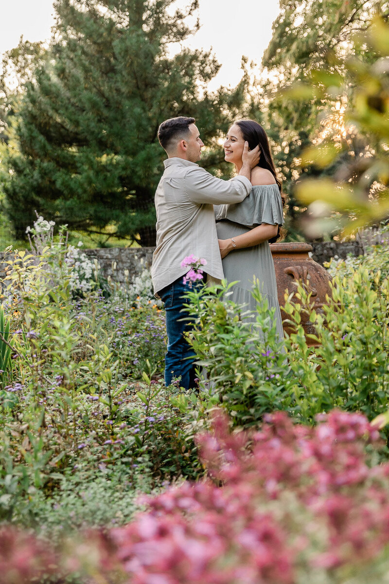 Couple standing in garden, Bernardsville Maternity Photographer