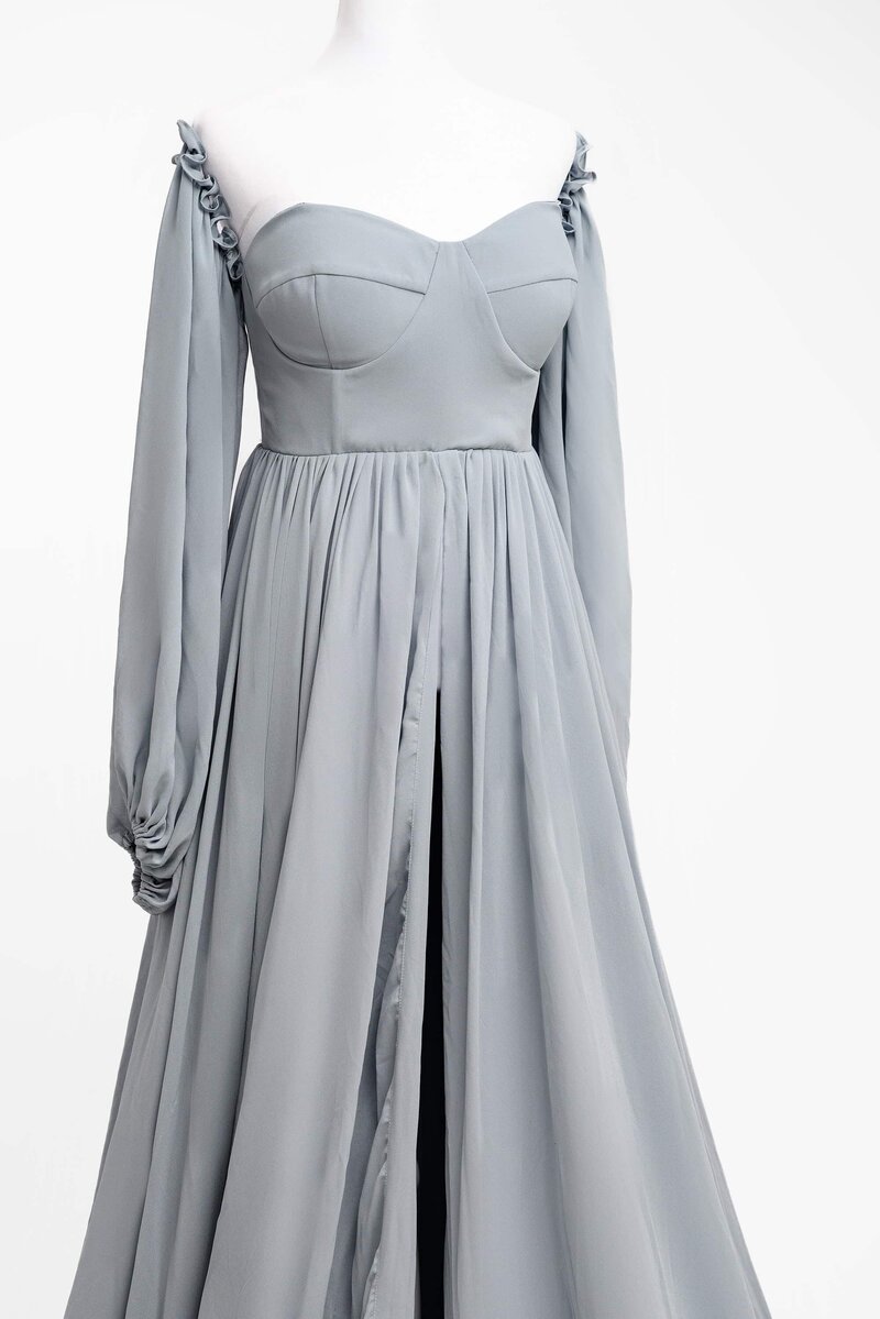 A blue chiffon maternity dress image