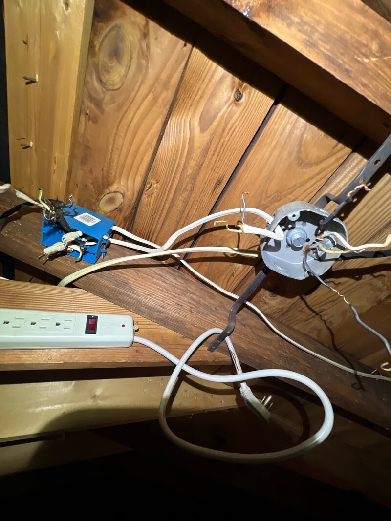 Faulty Wiring with extension cord in attic fixed and replaced by Evergreen Electric in Marietta