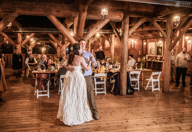 Dance floor photo inside rustic log cabin at Piney River Ranch