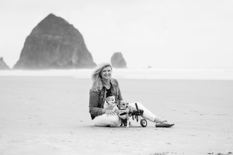 Black and white family photo with dogs Cannon Beach
