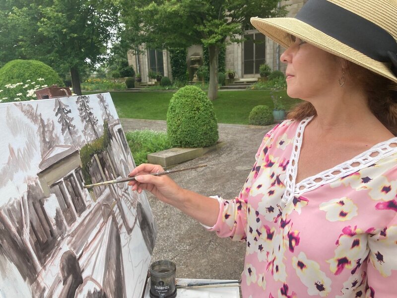 Linda Marino artist painting en plein air of wedding scene