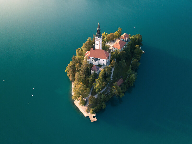 Drone photograph of Lake Bled in Slovenia at sunrise near Bled, Slovenia