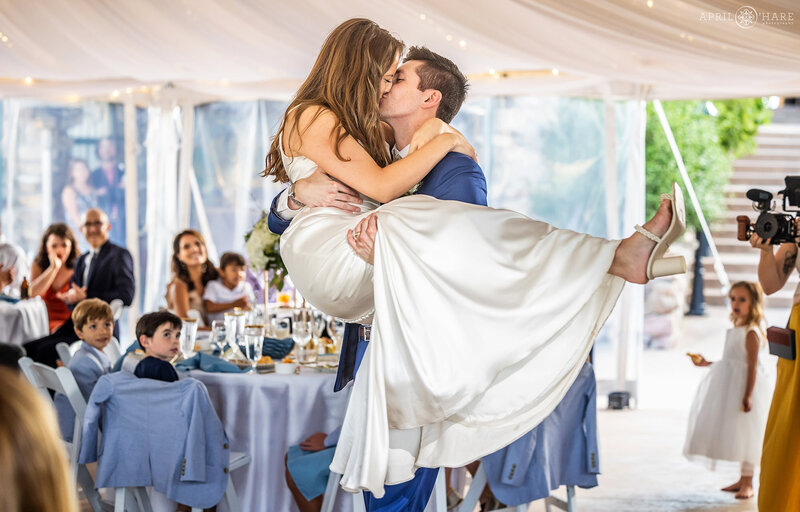 Cute First Dance Photo inside the Outdoor Tent at Cherokee Ranch & Castle Wedding Venue