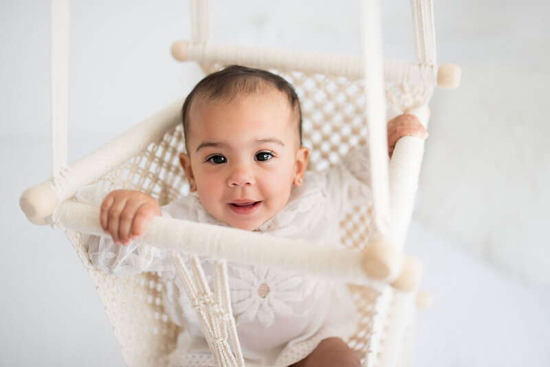 cute baby in a swing