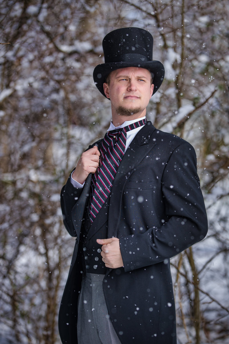 Groom in the snow during a winter portrait session