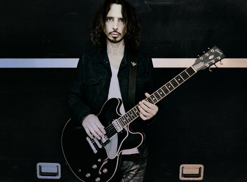 Chris Cornell portrait holding Signature ES-335 Gibson Guitar in black