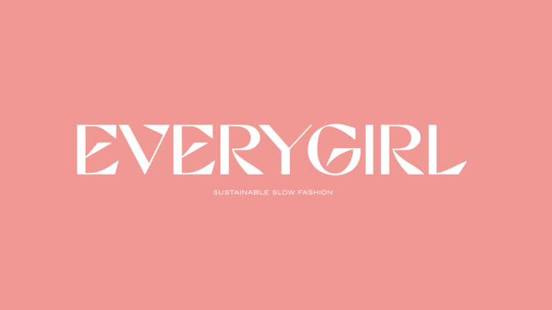 logo saying everygirl on a bright pink background