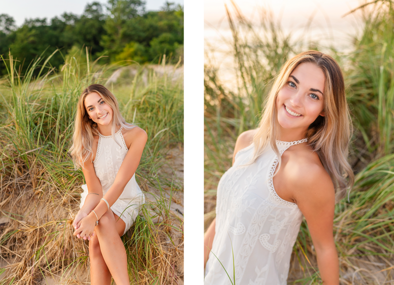 high school senior girl wearing a white dress in the sand dunes of a beach at lake Michigan