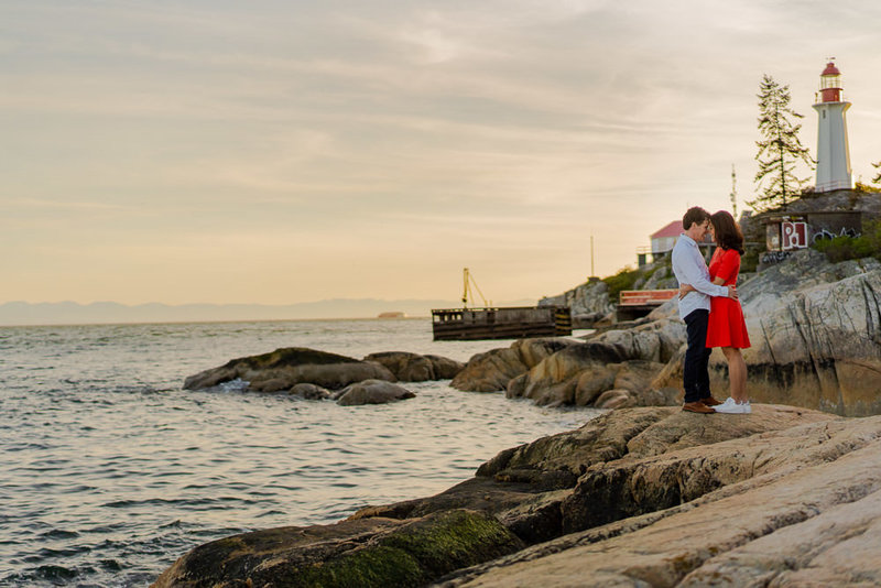 Couple holding each other for their Lighthouse engagement session
