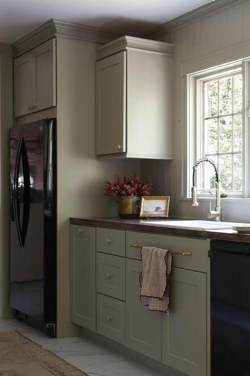 Moody Rustic Laundry Room renovation by Nadine Stay | Dark wood stained walls. Brown painted doors. DIY Ikea Pax hack. DIY mudroom built in cabinet. DIY shaker cabinet doors. DIY inset drawers. Basketweave brick floors.