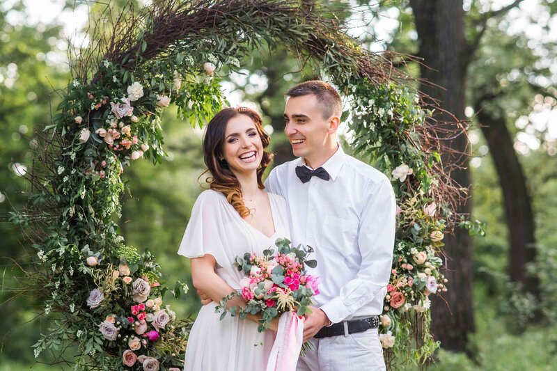 Casual bride and groom at outdoor garden wedding