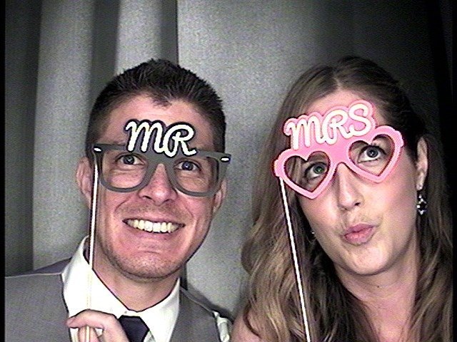classic photo booth image with bride and groom