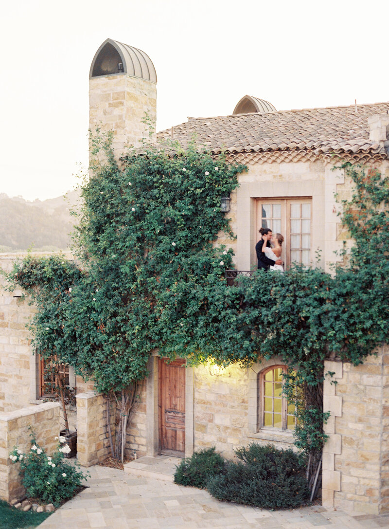 Bride and Groom on the Balcony of a Tuscan House