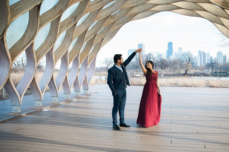 engaged couple twirling in lincoln park, chicago