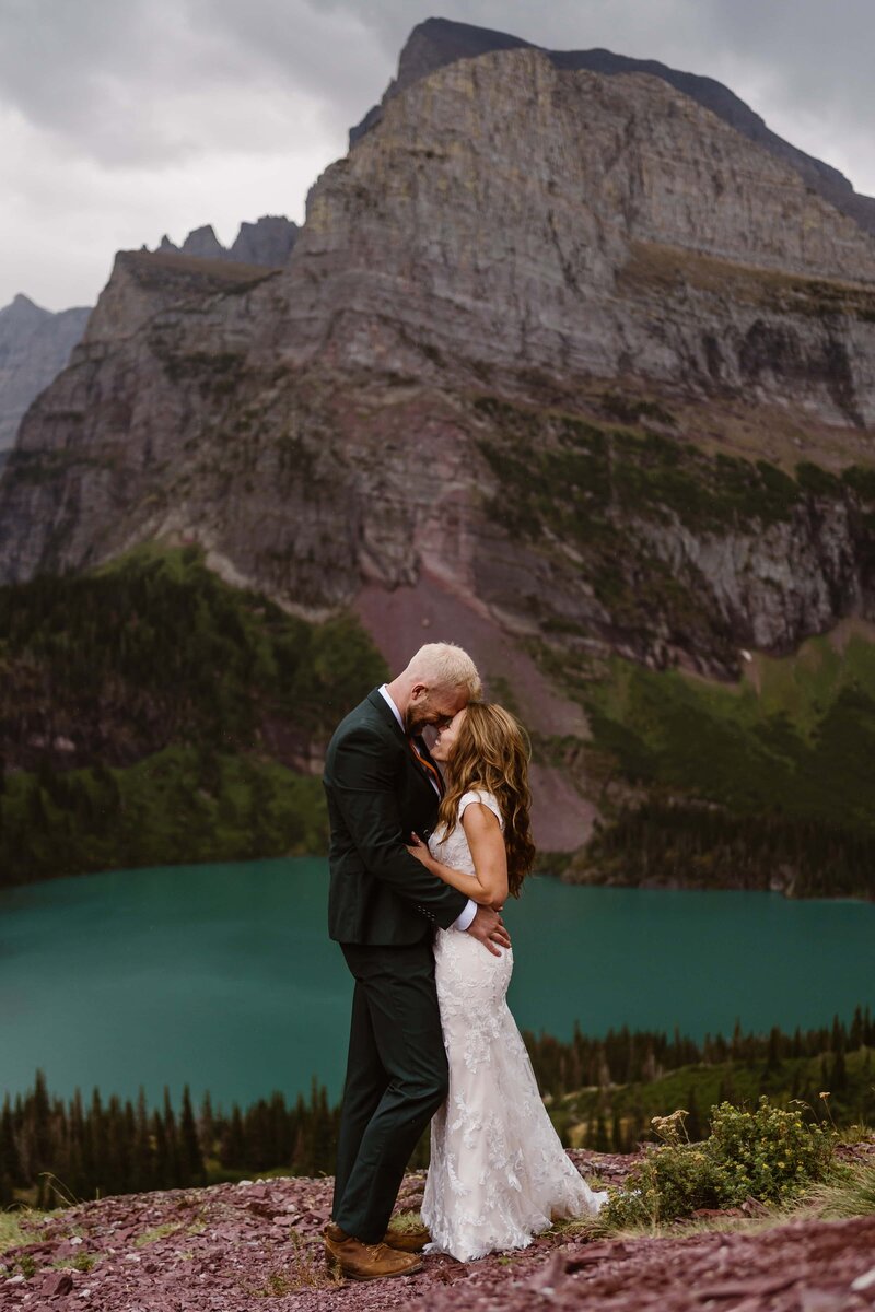 Couple hikes to Grinnell Glacier in Glacier National Park, Montana for their elopement