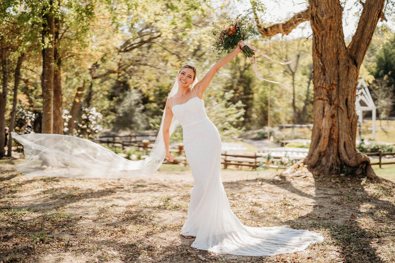 Bride by large tree