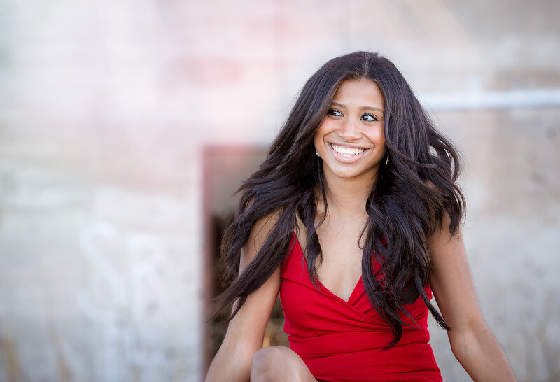 African american senior girl smiling in red dress in tulia tx