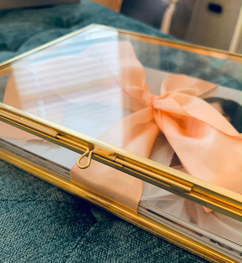 glass box with boudoir photos