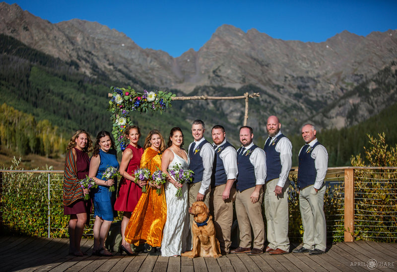Sunny wedding day during fall at Piney River Ranch