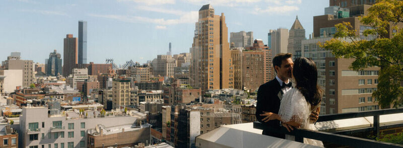 editorial style photo of wedding couple on a rooftop in Manhattan NYC