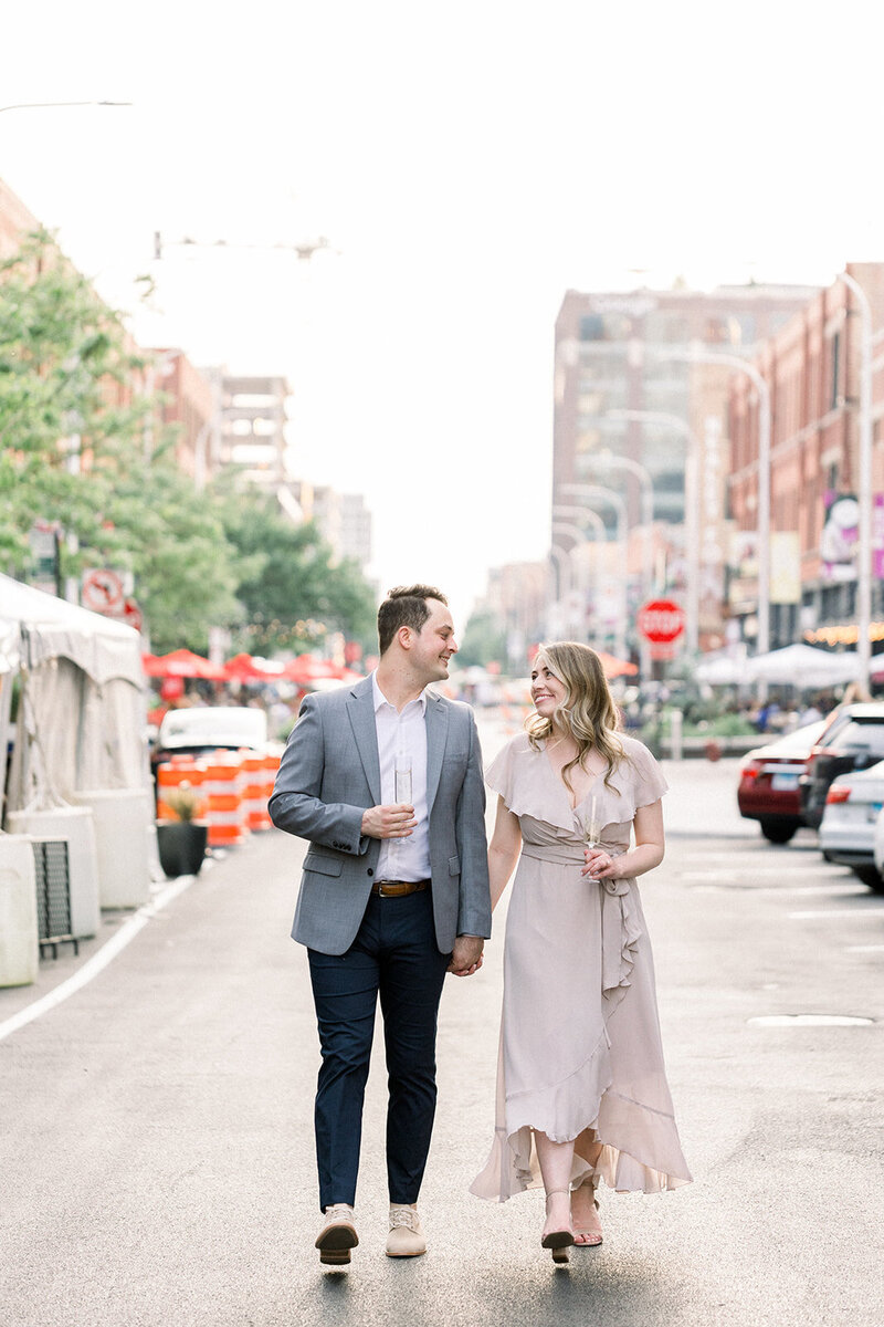 bride and groom walking together in chicago's west loop