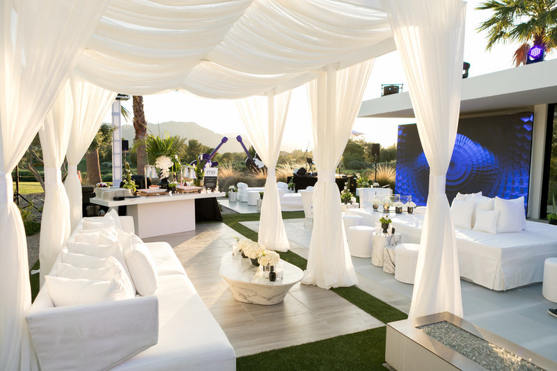 Luxuriously white draped outdoor 50th birthday party celebration set up