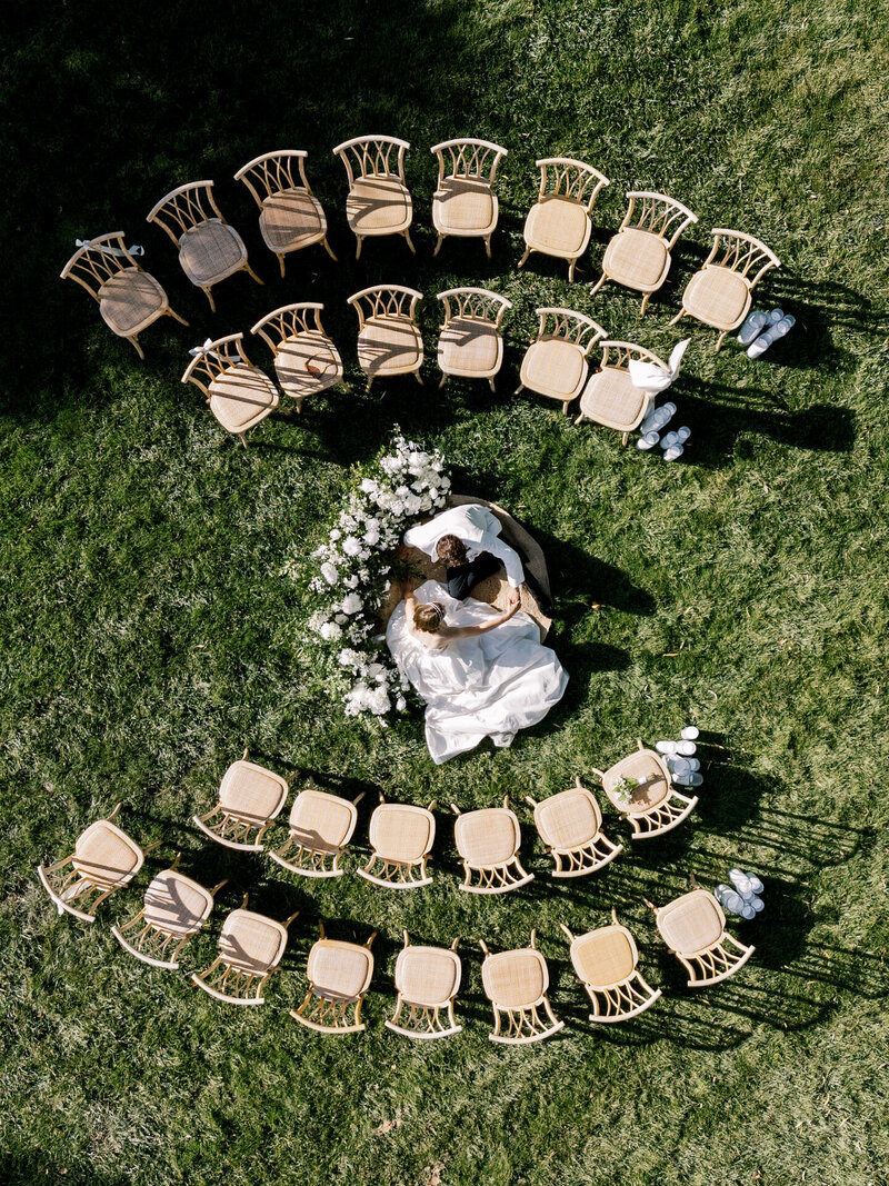DJI_20251022152538_0054_D bride and groom, build an Italian cake during their wedding reception at Niner winery in Paso Robles