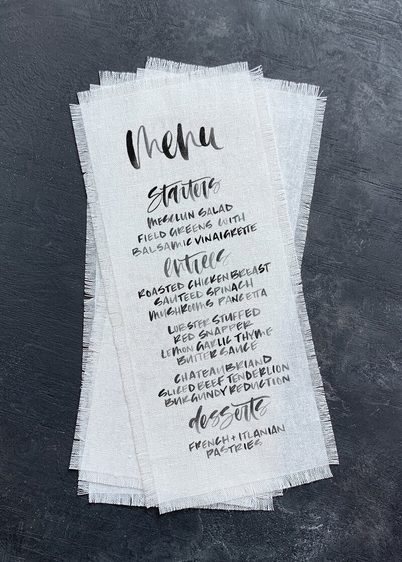 Fabric wedding dinner menu.  Having a wedding menu on fabric adds a unique wedding element to your day.