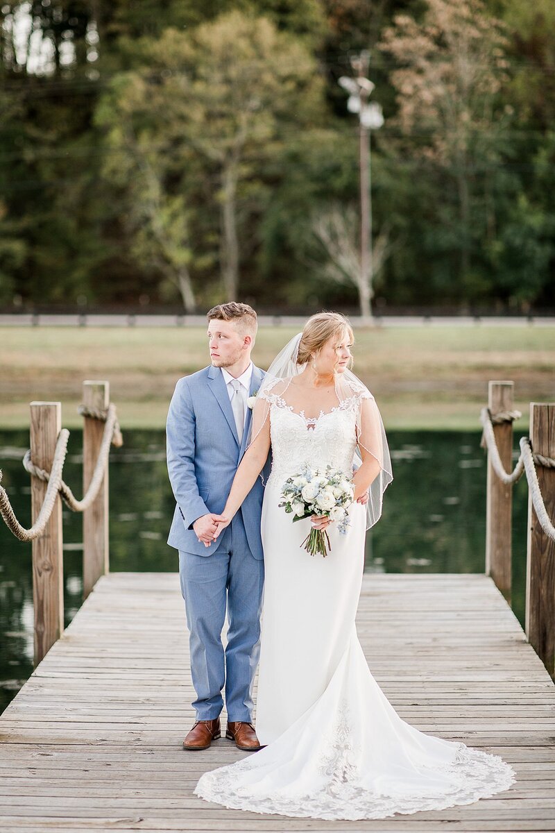 couple on dock by Knoxville Wedding Photographer, Amanda May Photos