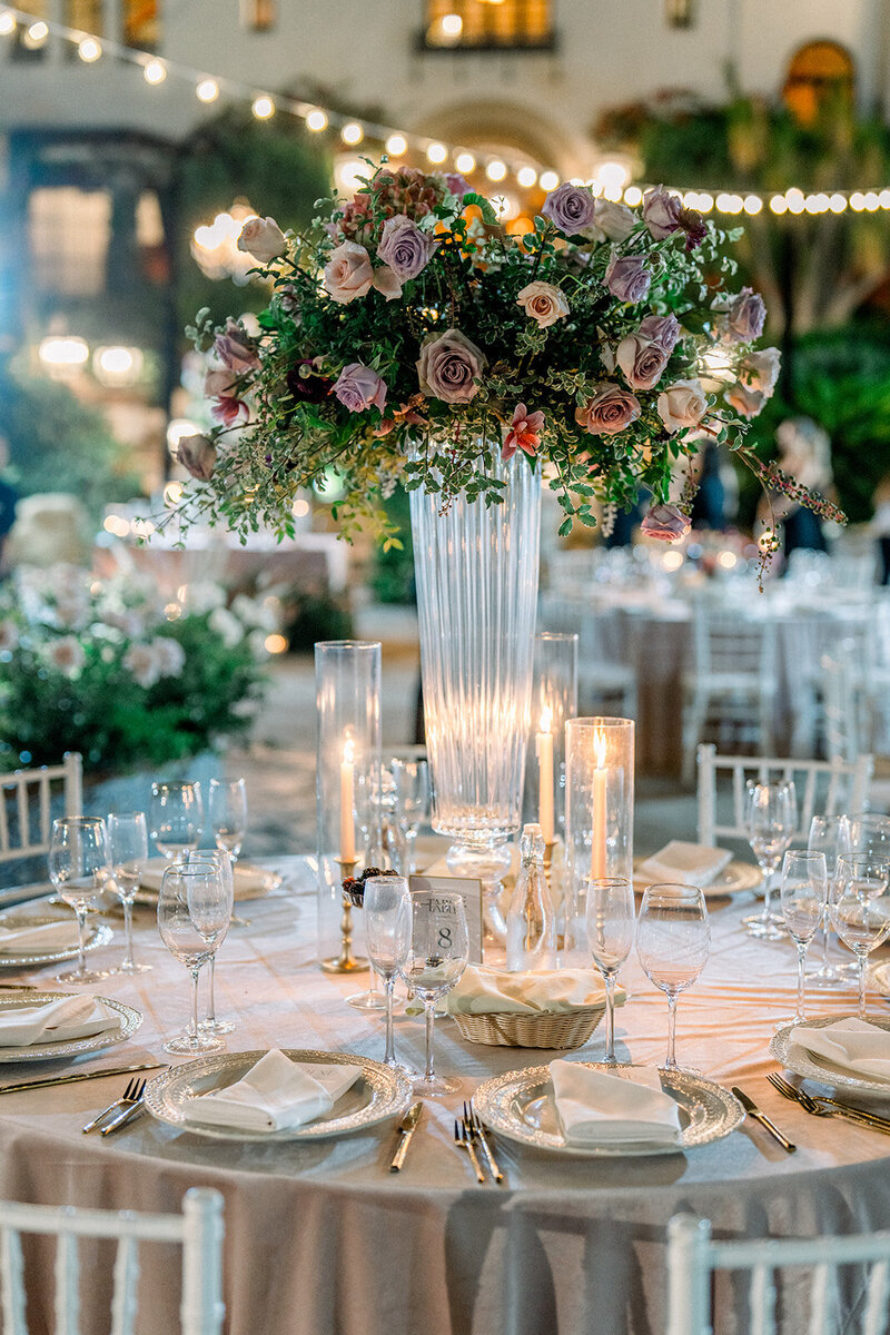 Elegant floral centerpiece and fine art table styling captured by a Southern California editorial wedding photographer