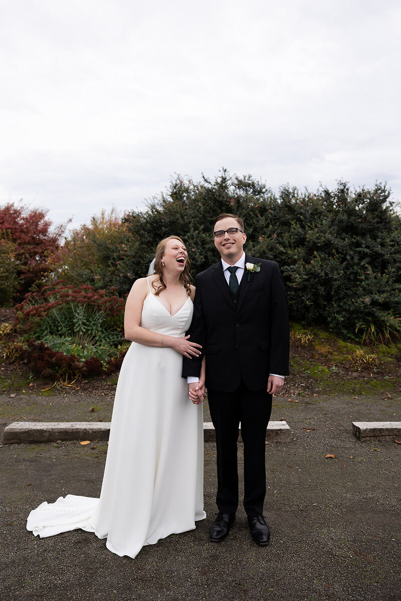 bride and groom laughing during oregon wedding