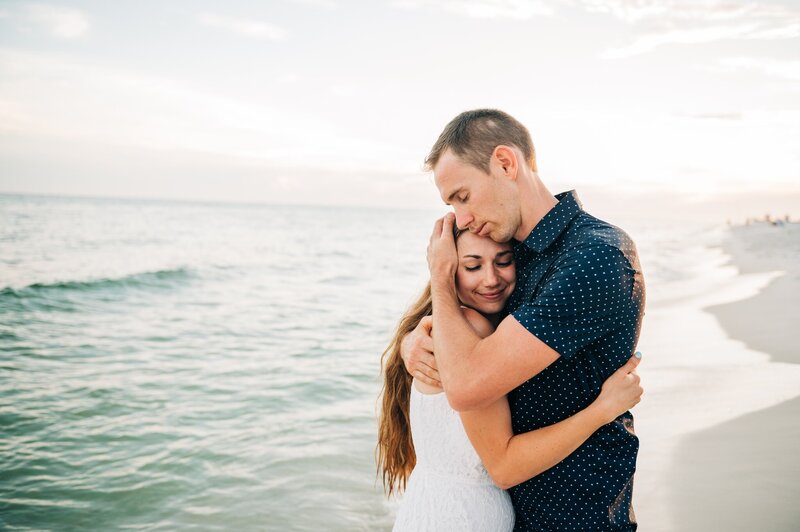 couple in embrace at Navarre Beach