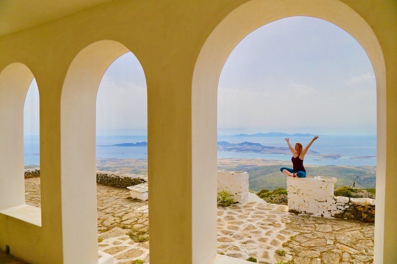 Yoga Therapist Meditating on Greek Island