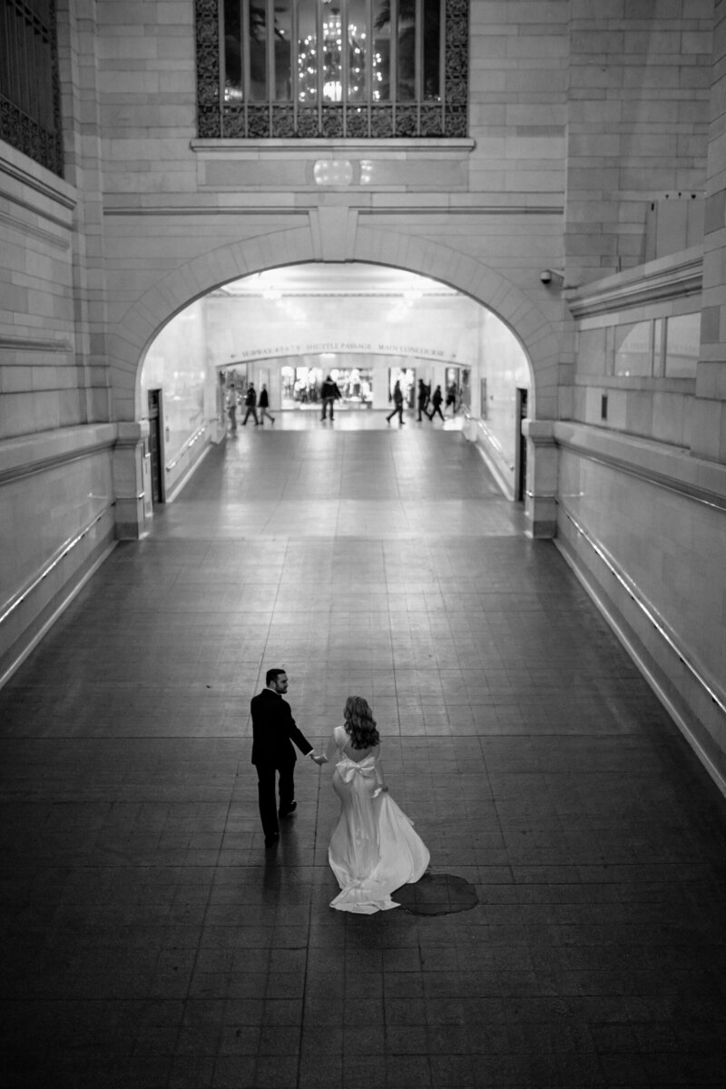 Photo of bride and groom in an elevator