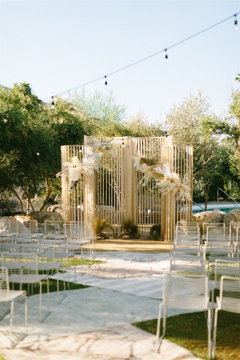 unique wedding ceremony alter with modern slated wood decor