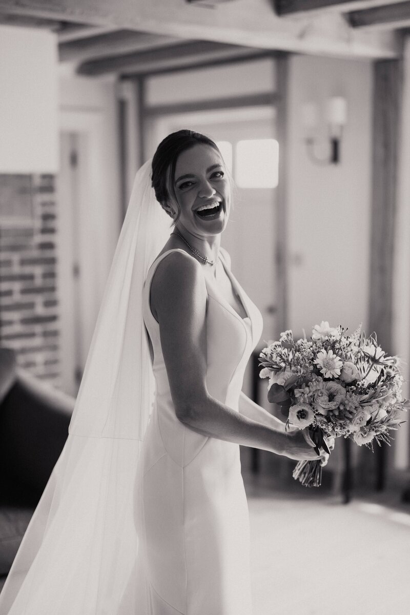 Bride portrait laughing before ceremony-1