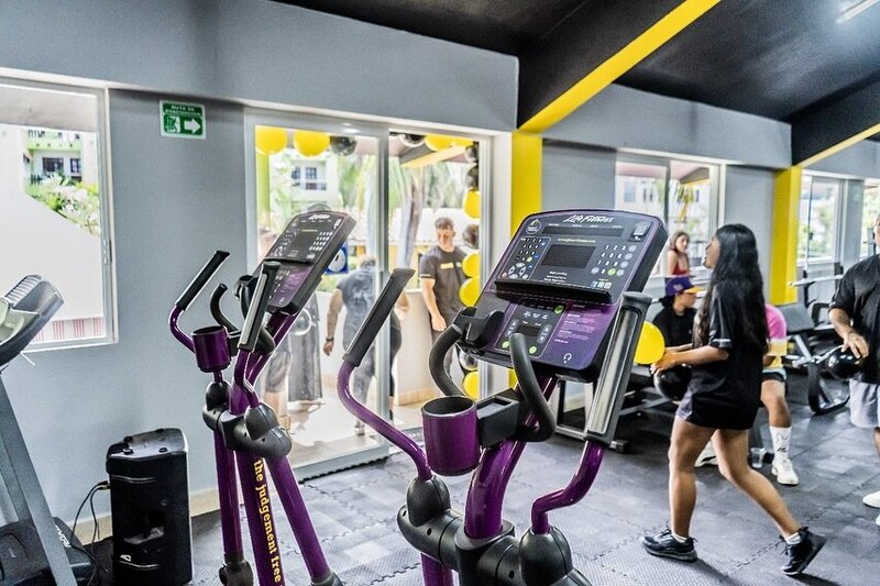 Black Gym in Puerto Escondido with advanced weight training equipment, cardio machines, and personal training services to support mind-body evolution.