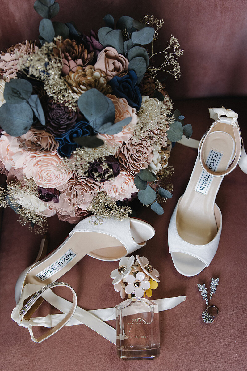 detail shots of brides flowers perfume and shoes on wedding day in lancaster pa